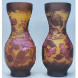 A pair of Galle tip Art Nouveau style cameo glass vases of waisted form each having a yellow