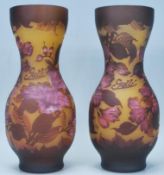 A pair of Galle tip Art Nouveau style cameo glass vases of waisted form each having a yellow