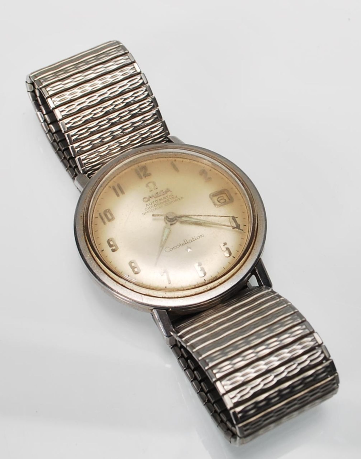 A vintage Omega Constellation Automatic Chronometer wristwatch having a champagne dial with Arabic - Bild 7 aus 7