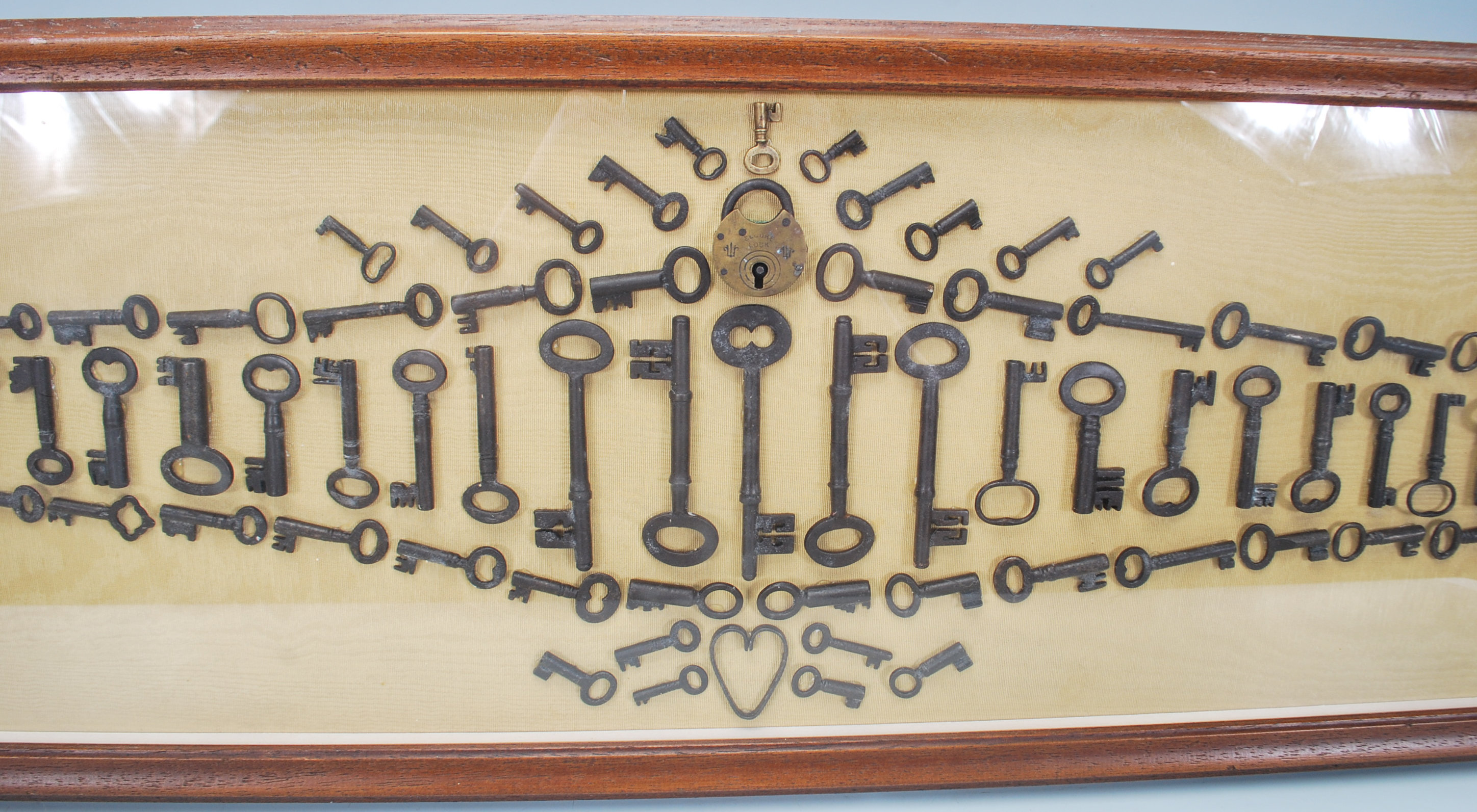 A selection of 19th Century antique keys and locks arranged into a geometric pattern and framed, set - Image 3 of 7