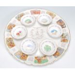 A 20th Century Royal Cauldon 'Seder dish' seven piece passover plate having a large round white