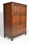 A Jaycee / Old Charm Jacobean revival oak tallboy