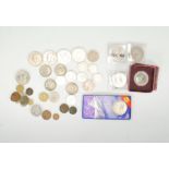 A collection of coins to include three 1999 £5 coi