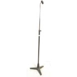 A vintage 20th Century adjustable mic stand in the