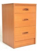 A retro teak wood upright bedside cabinet. Of pede