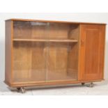 A mid century oak display cabinet bookcase room di