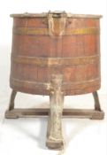 A 19th century coopered oak barrel washing / machi