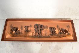 A large mid century African copper panel in relief