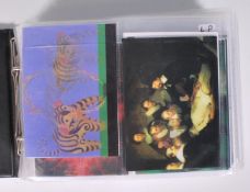 An album of lenticular holographic postcards, subj