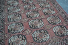 A large 20th Century Persian Islamic floor rug hav