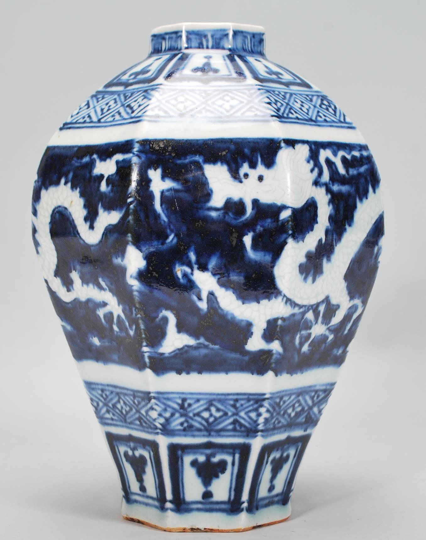 A 19th Century Chinese earthenware vase of taperin