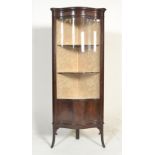 An Edwardian mahogany display cabinet, free standi