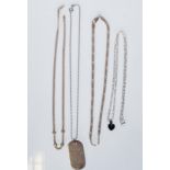 A selection of silver necklaces to include a playb