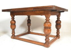 A large early 20th Century oak draw leaf refectory