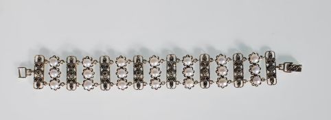 A decorative silver and marcasite bracelet having