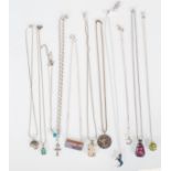 A selection of silver pendant necklaces to include
