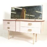 A vintage 20th Century melamine dressing table, ce