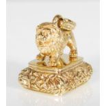 A brass seal of square form having a lion mount at