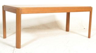 A retro mid 20th Century teak wood coffee table of