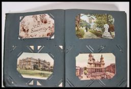 An early 20th Century postcard album including UK