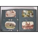 An early 20th Century postcard album including UK