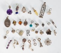 A selection of silver charms and pendants to inclu