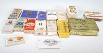 A collection of vintage cigarette packets and ciga