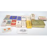 A collection of vintage cigarette packets and ciga