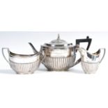 VICTORIAN HALLMARKED SILVER TEA SERVICE BY EDWARD HUTTON LONDON