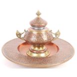 19TH CENTURY ISLAMIC COPPER AND BRASS INKWELL AND STAND