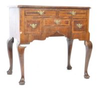 EARLY 19TH CENTURY WALNUT LOWBOY WITH CARVED APRON