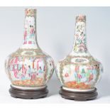 NEAR PAIR OF 19TH CENTURY CHINESE CANTON ENAMEL BOTTLE VASES