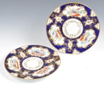 PAIR OF BELIEVED DR WALL WORCESTER PORCELAIN BIRD OF PARADISE PLATES