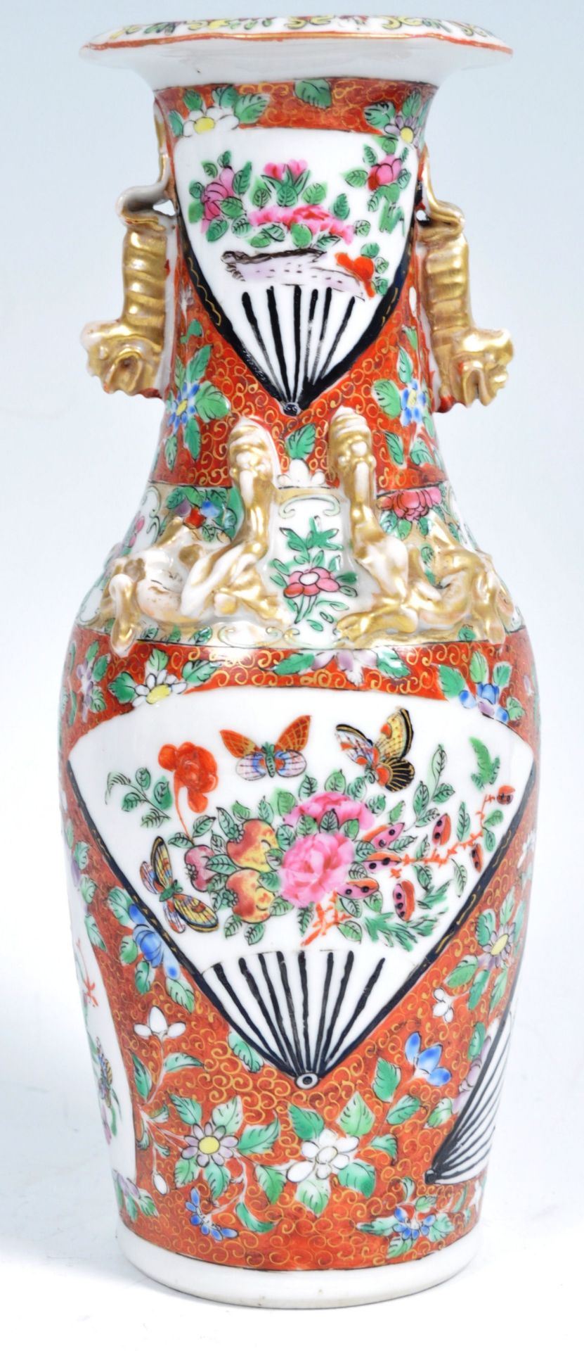 19TH CENTURY CHINESE RED CORAL GROUND VASE WITH FAN SHAPED PANELS