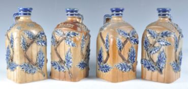 RARE SET OF FOUR FULHAM POTTERY CHARLES BAILEY DECANTERS