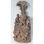 EARLY 18TH CENTURY CARVED FIGURINE GROUP OF CHERUBS CLIMBING TREE