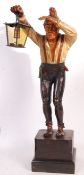 LARGE EARLY 20TH CENTURY BLACK FOREST CARVED FIGURE