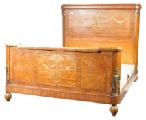 LATE 19TH CENTURY FRENCH EMPIRE STYLE WALNUT AND SATINWOOD BED
