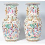PAIR OF 19TH CENTURY CHINESE CANTON VASES WITH DRAGON HANDLES