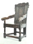 ANTIQUE CARVED OAK WAINSCOT CHAIR WITH SHAPED ARM RESTS