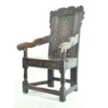 ANTIQUE CARVED OAK WAINSCOT CHAIR WITH SHAPED ARM RESTS