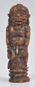 UNUSUAL INDONESIAN CARVED BONE SCULPTURE OF AN ANCIENT DEITY
