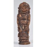 UNUSUAL INDONESIAN CARVED BONE SCULPTURE OF AN ANCIENT DEITY
