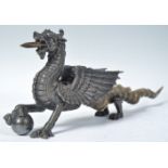 19TH CENTURY SILVER PLATED AND HORN DRAGON TABLE LIGHTER