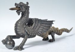 19TH CENTURY SILVER PLATED AND HORN DRAGON TABLE LIGHTER