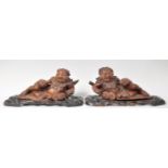 A PAIR OF CHINESE CARVED WOOD FIGURES OF RECLINING LIN HAI AND HIS THREE-LEGGED TOAD