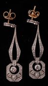 A Pair of Art Deco Platinum, Gold and Diamond Drop Earrings