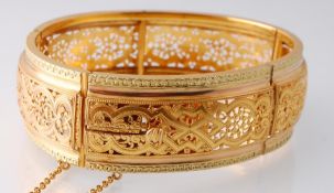 An 18ct gold French Bangle