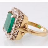 18 CT YELLOW AND WHITE GOLD EMERALD AND DIAMOND CLUSTER RING