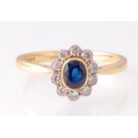 A Hallmarked 18ct Gold Sapphire & Diamond Cluster Ring